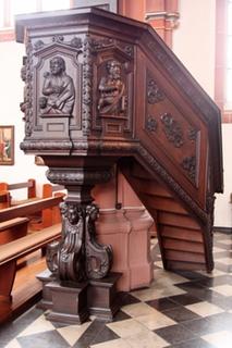 The pulpit from the monastery church from 1620 depicting the four evangelists and on the rear the Holy St. Francis.